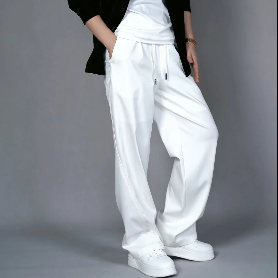 Loose wide leg white minimalist pants with a hanging straight leg feel