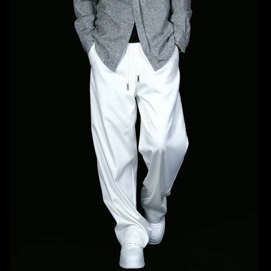 Loose wide leg white minimalist pants with a hanging straight leg feel